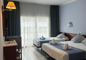 Habitación triple matrimonial
